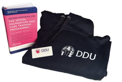 image of hoodie and oxford press book